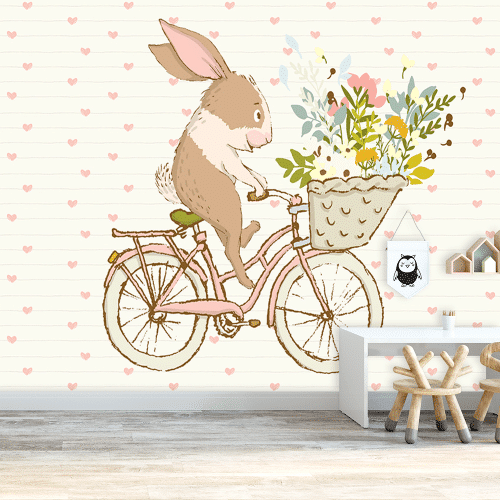 królik jadący na rowerze